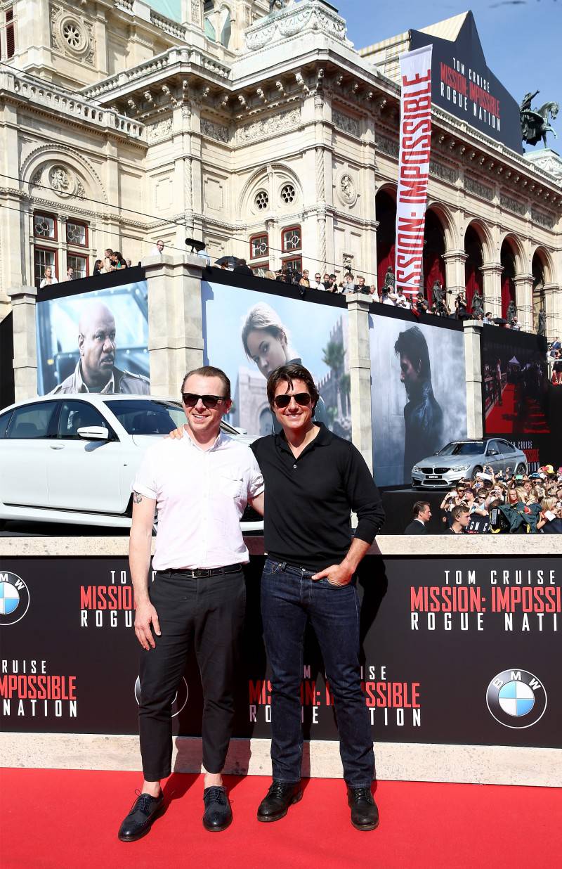 VIENNA, AUSTRIA - JULY 23:  Actors Simon Pegg and Tom Cruise arrive for the world premiere of 'Mission: Impossible - Rogue Nation' at the Opera House (Wiener Staatsoper) on July 23, 2015 in Vienna, Austria.  (Photo by Andreas Rentz/Getty Images for Paramount Pictures International)