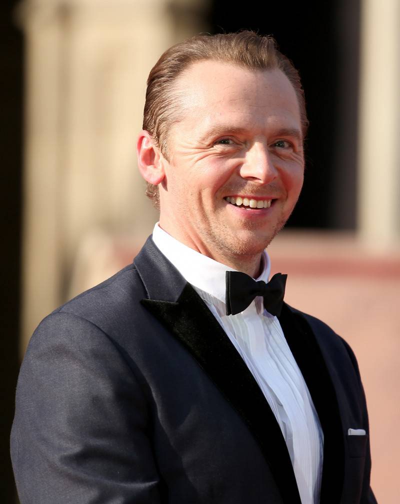 VIENNA, AUSTRIA - JULY 23:  Simon Pegg smiles on stage during the world premiere of 'Mission: Impossible - Rogue Nation' at the Opera House (Wiener Staatsoper) on July 23, 2015 in Vienna, Austria.  (Photo by Monika Fellner/Getty Images for Paramount Pictures International)