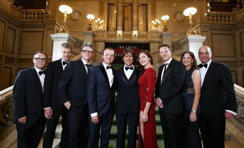VIENNA, AUSTRIA - JULY 23:   (EDITORS NOTE: This image has been digitally manipulated) Tom Cruise (C) and members of the cast and crew pose during the world premiere of 'Mission: Impossible - Rogue Nation' at the Opera House (Wiener Staatsoper) on July 23, 2015 in Vienna, Austria.  (Photo by Andreas Rentz/Getty Images for Paramount Pictures International)