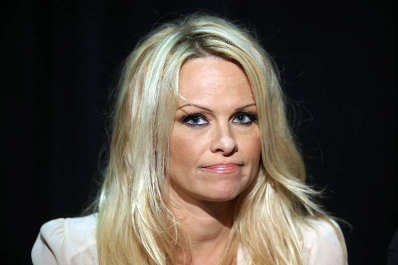 Canadian born US actress Pamela Anderson gives a press conference in support for the Sea Shepherd Conservation Society founder in Frankfurt am Main, western Germany on June 13, 2012. Canadian animal rights activist Paul Watson is on bail while German authorities decide whether he can be extradited to Costa Rica on charges stemming from a high-seas confrontation over shark finning in 2002. AFP PHOTO / FREDRIK VON ERICHSEN GERMANY OUT (Photo credit should read FREDRIK VON ERICHSEN/AFP/GettyImages)