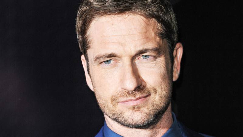 Gerard Butler arrives at the Ermenegildo Zegna Boutique opening on Thursday, Nov. 7, 2013 in Beverly Hills, Calif. (Photo by Richard Shotwell/Invision/AP)