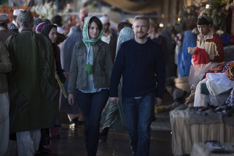 Left to right: Tina Fey plays Kim Baker and Martin Freeman plays Iain MacKelpie in Whiskey Tango Foxtrot from Paramount Pictures and Broadway Video/Little Stranger Productions in theatres March 4, 2016.