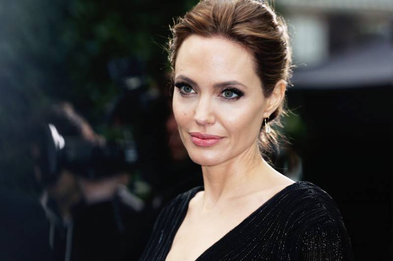 Mandatory Credit: Photo by James Shaw/Rex/REX USA (2069901g) Angelina Jolie 'Maleficent' film event, Kensington Palace, London, Britain - 08 May 2014